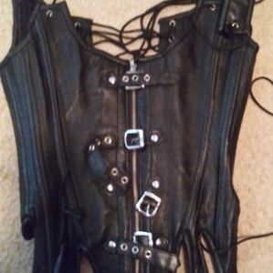 A leather corset.Its neen worn once.